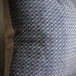 wool and cotton cushion in river blue closeup details of woven wool