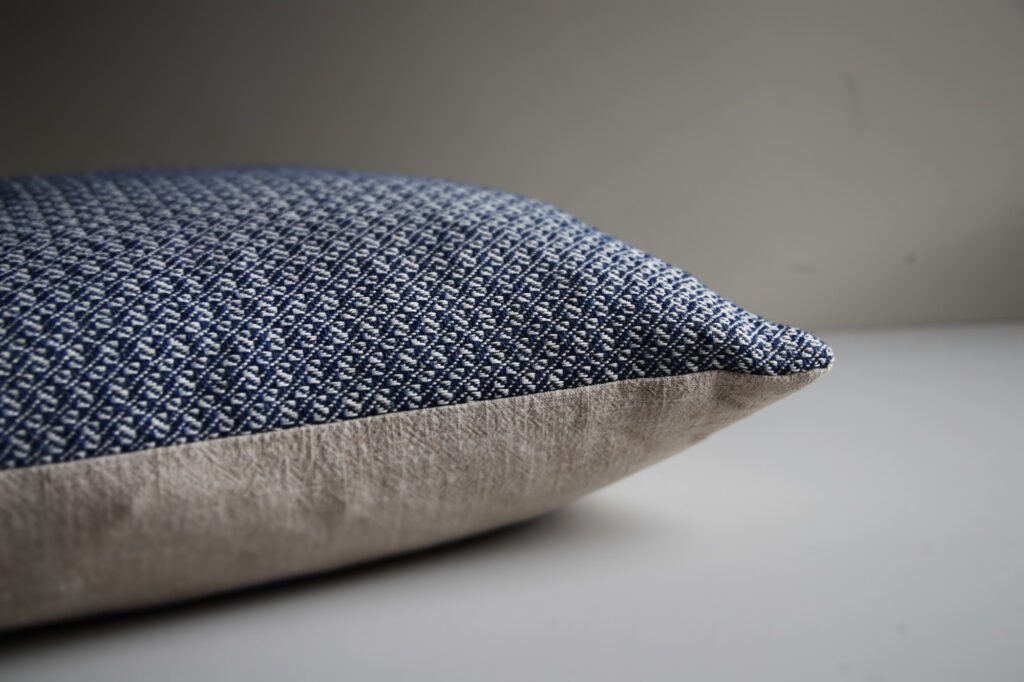 wool and cotton cushion in river blue closeup details of pretty handwoven design